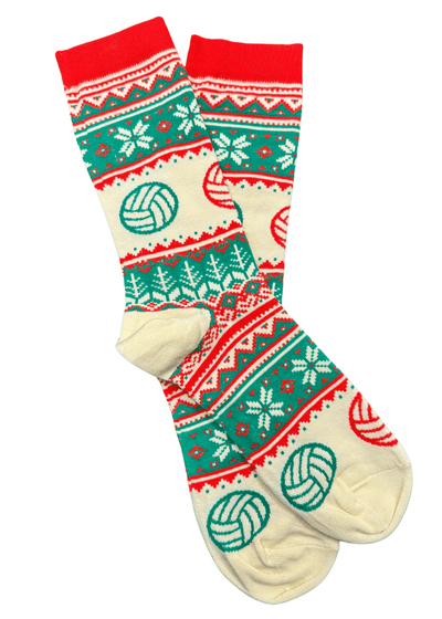 Pair of festive socks with reindeer and snowflake pattern on a white background